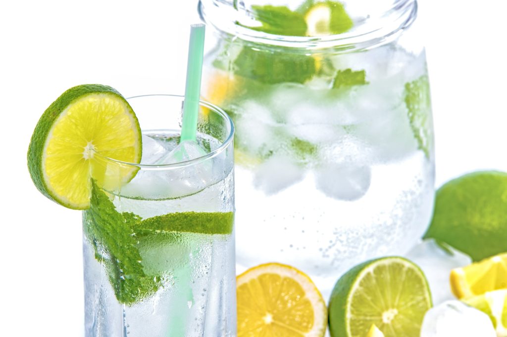 glass of water with lime slice